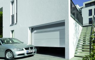 Acheter une porte de garage sectionnelle gris 7016