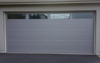 Déclaration obligatoire pour une porte de garage sectionnelle ? Réglementation urbanisme